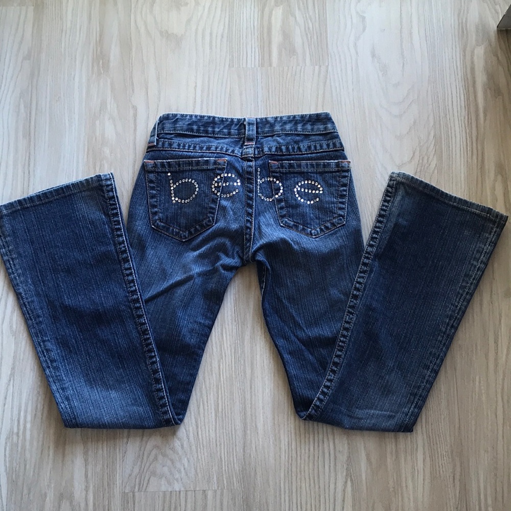 Bebe rhinestone boot leg jeans.